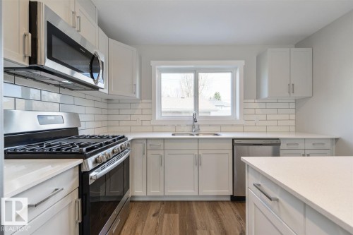 7940/7942 82 Avenue, Edmonton, AB - Indoor Photo Showing Kitchen With Double Sink With Upgraded Kitchen