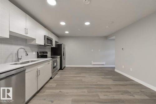 7940/7942 82 Avenue, Edmonton, AB - Indoor Photo Showing Kitchen With Double Sink