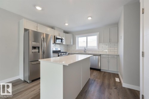 7940/7942 82 Avenue, Edmonton, AB - Indoor Photo Showing Kitchen With Upgraded Kitchen