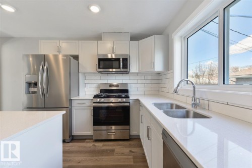 7940/7942 82 Avenue, Edmonton, AB - Indoor Photo Showing Kitchen With Double Sink