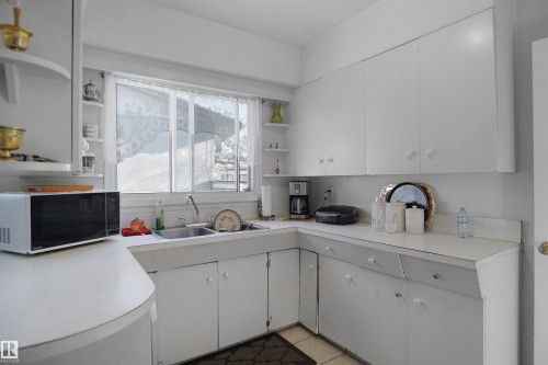 13007 93 Street, Edmonton, AB - Indoor Photo Showing Kitchen With Double Sink
