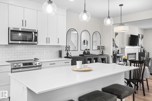 7012 54 Avenue, Beaumont, AB - Indoor Photo Showing Kitchen With Upgraded Kitchen