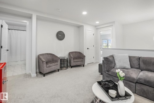 7012 54 Avenue, Beaumont, AB - Indoor Photo Showing Living Room