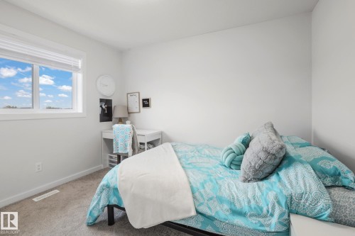 7012 54 Avenue, Beaumont, AB - Indoor Photo Showing Bedroom