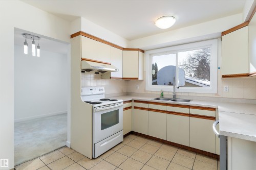 10951 35A Avenue, Edmonton, AB - Indoor Photo Showing Kitchen With Double Sink