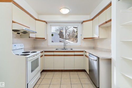 10951 35A Avenue, Edmonton, AB - Indoor Photo Showing Kitchen With Double Sink