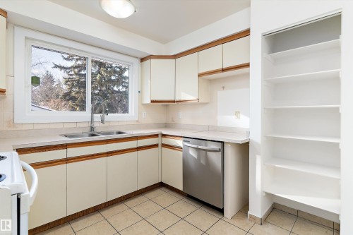 10951 35A Avenue, Edmonton, AB - Indoor Photo Showing Kitchen With Double Sink