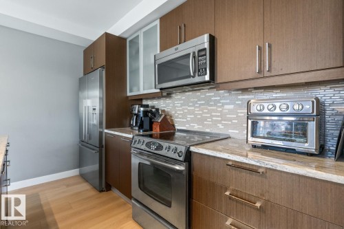 405 10388 105 Street, Edmonton, AB - Indoor Photo Showing Kitchen With Stainless Steel Kitchen