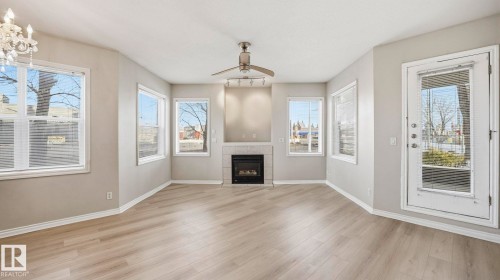 101 10346 117 Street, Edmonton, AB - Indoor Photo Showing Living Room With Fireplace