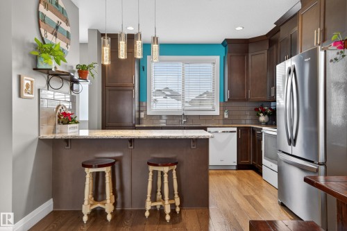 135 Gilmore Way, Spruce Grove, AB - Indoor Photo Showing Kitchen With Upgraded Kitchen
