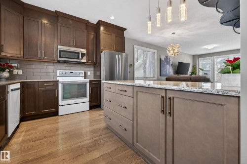 135 Gilmore Way, Spruce Grove, AB - Indoor Photo Showing Kitchen With Upgraded Kitchen