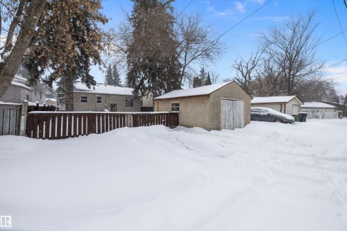 Snow covered house featuring an outdoor structure - 11242 72 Avenue, Edmonton, AB - Outdoor