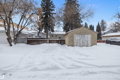 Snow covered rear of property with an outbuilding - 11242 72 Avenue, Edmonton, AB - Outdoor