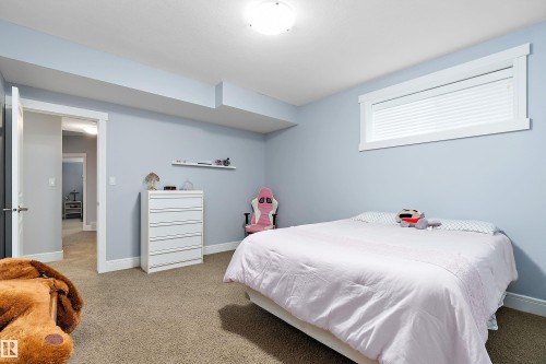 Carpeted bedroom with baseboards - 1409 Westerra Bay, Stony Plain, AB - Indoor Photo Showing Bedroom