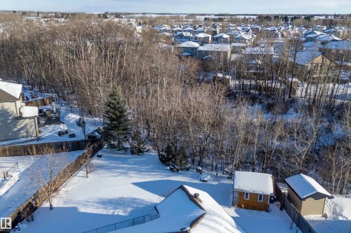 Snowy aerial view featuring a residential view - 1409 Westerra Bay, Stony Plain, AB - Outdoor With View