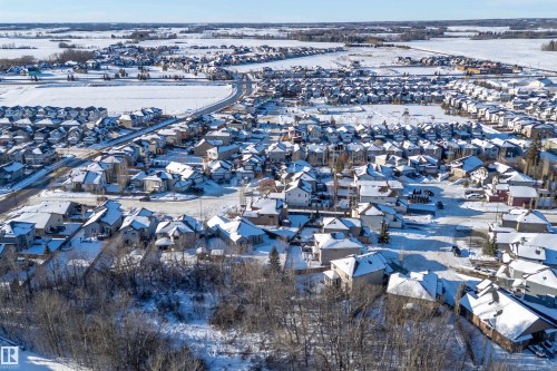 Snowy aerial view with a residential view - 1409 Westerra Bay, Stony Plain, AB - Outdoor With View
