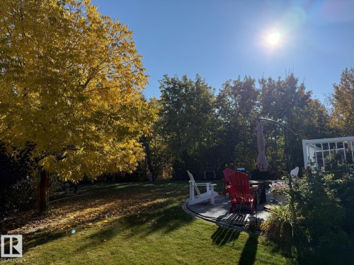 View of grassy yard featuring a patio - 1409 Westerra Bay, Stony Plain, AB - Outdoor