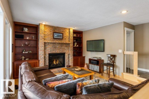 3 Pearson Place, St. Albert, AB - Indoor Photo Showing Living Room With Fireplace