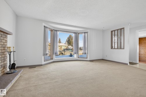 3801 33 Avenue, Leduc, AB - Indoor With Fireplace