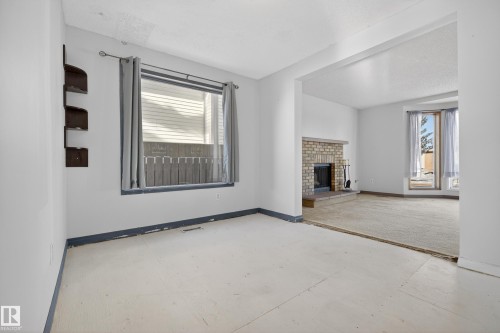3801 33 Avenue, Leduc, AB - Indoor With Fireplace
