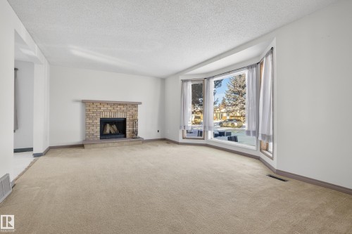 3801 33 Avenue, Leduc, AB - Indoor Photo Showing Living Room With Fireplace