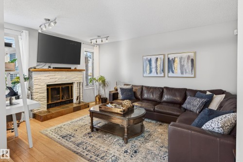 52 Langholm Drive, St. Albert, AB - Indoor Photo Showing Living Room With Fireplace