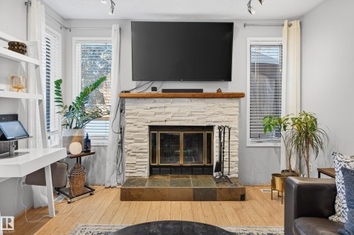 52 Langholm Drive, St. Albert, AB - Indoor Photo Showing Living Room With Fireplace