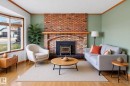 3917 43 Avenue, Leduc, AB  - Indoor Photo Showing Living Room With Fireplace 