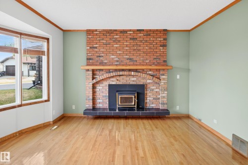 3917 43 Avenue, Leduc, AB - Indoor Photo Showing Living Room With Fireplace