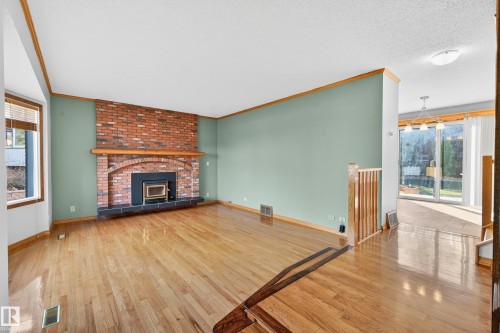 3917 43 Avenue, Leduc, AB - Indoor Photo Showing Living Room With Fireplace