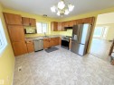 129 A St. Andrews Drive, Stony Plain, AB  - Indoor Photo Showing Kitchen With Double Sink 