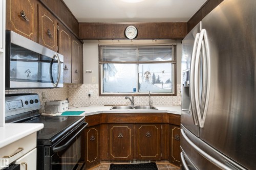 3424 65 Street, Edmonton, AB - Indoor Photo Showing Kitchen With Double Sink