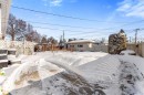 Snowy yard featuring a fenced backyard - 3519 111B Street, Edmonton, AB  - Outdoor 