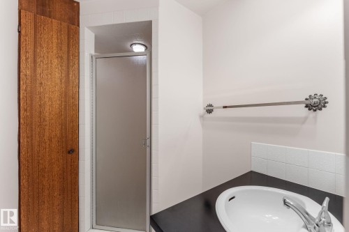 Full bath with a stall shower and vanity - 3519 111B Street, Edmonton, AB - Indoor Photo Showing Bathroom