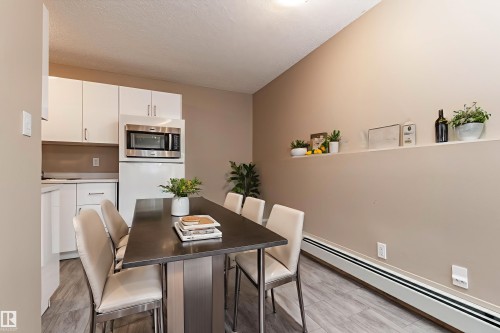 B01 10620 104 Street, Edmonton, AB - Indoor Photo Showing Dining Room