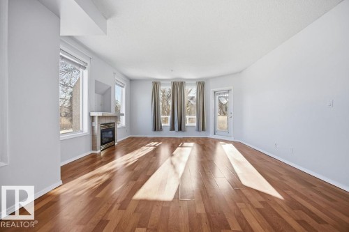 202 8108 109 Street, Edmonton, AB - Indoor Photo Showing Other Room With Fireplace