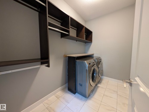 34 3090 Cameron Heights Way, Edmonton, AB - Indoor Photo Showing Laundry Room