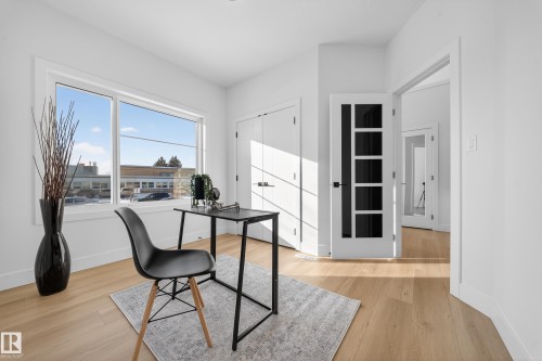 Office featuring light wood-type flooring - 9907 68 Street, Edmonton, AB - Indoor Photo Showing Office