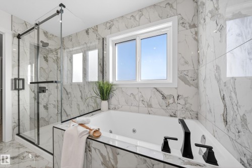 Bathroom with a marble finish shower and a whirlpool tub - 9907 68 Street, Edmonton, AB - Indoor Photo Showing Bathroom