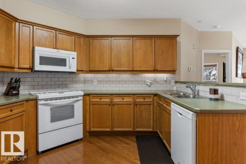 101 260 Sturgeon Road, St. Albert, AB - Indoor Photo Showing Kitchen With Double Sink