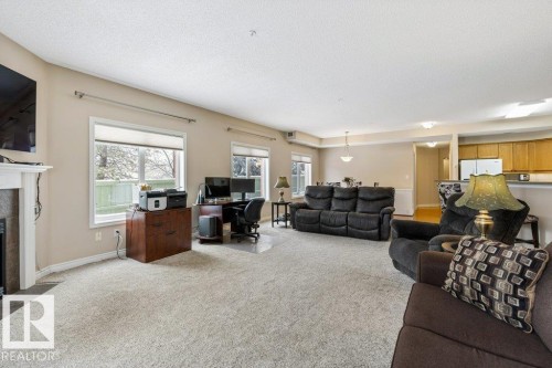 101 260 Sturgeon Road, St. Albert, AB - Indoor Photo Showing Living Room With Fireplace