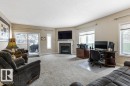 101 260 Sturgeon Road, St. Albert, AB  - Indoor Photo Showing Living Room With Fireplace 