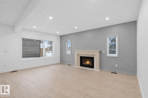 11121 51 Street, Edmonton, AB - Indoor Photo Showing Living Room With Fireplace