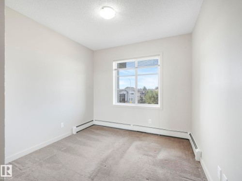 317 1144 Adamson Drive, Edmonton, AB - Indoor Photo Showing Other Room