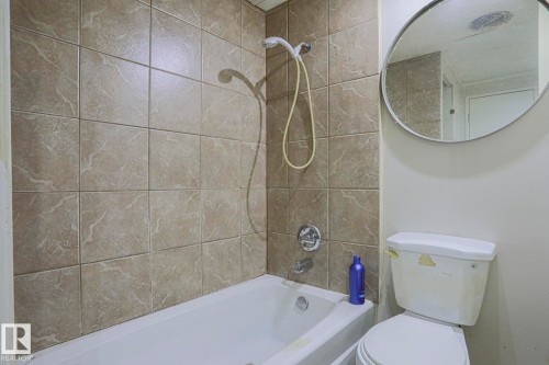 Bathroom with toilet and  shower combination - 19 Ridgeway Drive Nw, Edmonton, AB - Indoor Photo Showing Bathroom