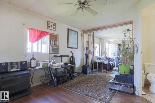Office space featuring ceiling fan and dark wood finished floors - 19 Ridgeway Drive Nw, Edmonton, AB - Indoor