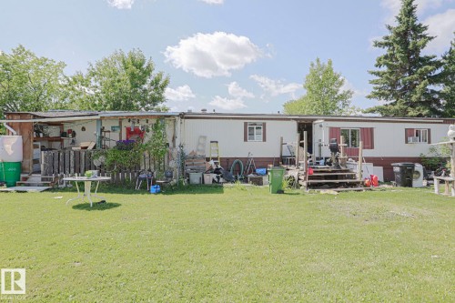 Rear view of house with a yard - 19 Ridgeway Drive Nw, Edmonton, AB - Outdoor