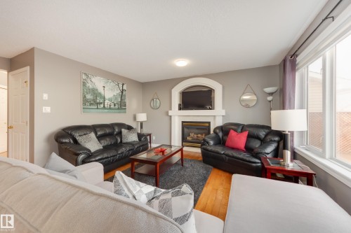 2844 40B Avenue, Edmonton, AB - Indoor Photo Showing Living Room With Fireplace