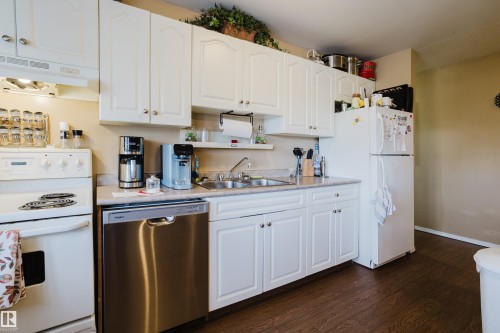 402A 2908 116A Avenue, Edmonton, AB - Indoor Photo Showing Kitchen With Double Sink