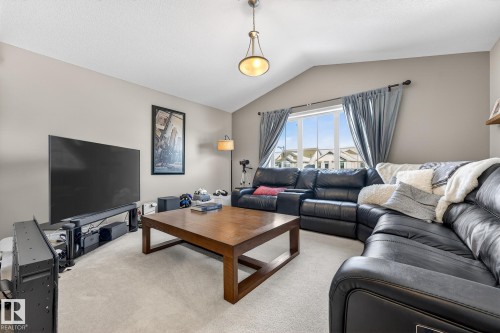 Living room featuring light carpet - 1734 63A Street, Edmonton, AB - Indoor Photo Showing Living Room